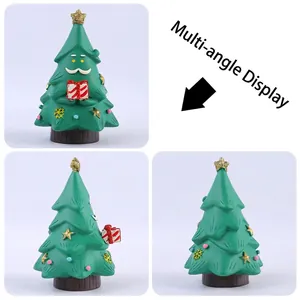 Simpatica statuetta di albero di Natale in resina da scrivania vista da più angolazioni