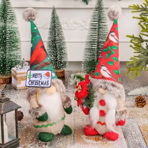 Pair of festive Christmas gnomes with bird patterns for holiday home decor and gifts.