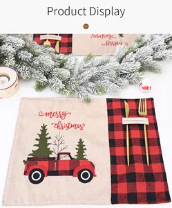Festive Christmas placemat featuring a red truck and buffalo plaid pattern with cutlery.