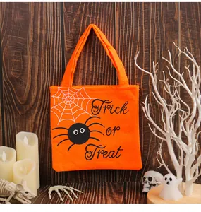 Orange Halloween candy tote bag featuring a spider design and Trick or Treat text