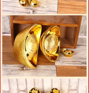 Detailed view of golden Chinese ingots for auspicious New Year prosperity decorations