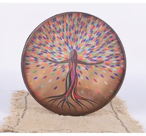 Tambor chamánico artístico con diseño de árbol de la vida sobre arpillera
