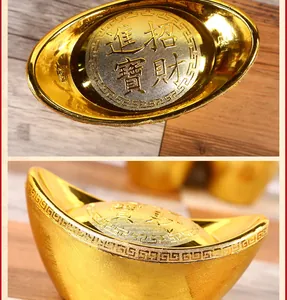 Close-up detail of traditional golden Chinese Sycee ingot with embossed wealth blessing.