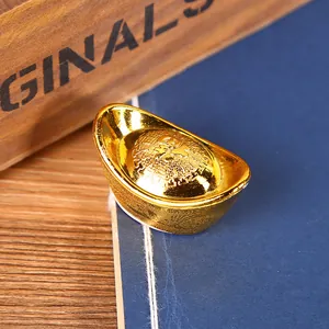 Traditional gold Sycee Yuanbao decoration for Chinese New Year wealth and luck