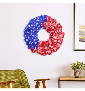 Patriotic Independence Day wreath featuring American flag stars and stripes on white wall