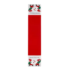 Christmas table runner with embroidered gnomes and Merry Christmas text on white background