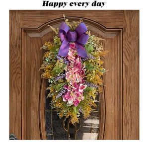 Vibrant artificial purple hydrangea teardrop door swag with large ribbon bow for home decor