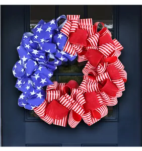 Patriotic Independence Day wreath with US flag stars and stripes on a blue door