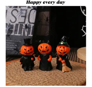 Set of three mini Halloween pumpkin resin figurines: gentleman, devil, and witch styles