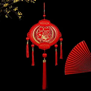 Exquisite close-up of red Chinese New Year Fu character hanging ornament with tassels