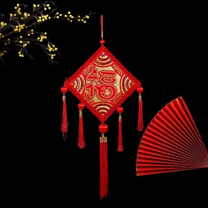 Traditional red Chinese Fu character hanging ornament with tassels for Lunar New Year