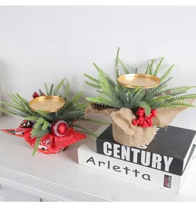 Christmas candle holder centerpiece with red berries and pinecones for festive decor