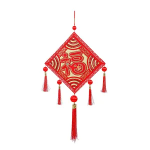 Traditional Chinese New Year hanging decoration with red Fu character and tassels