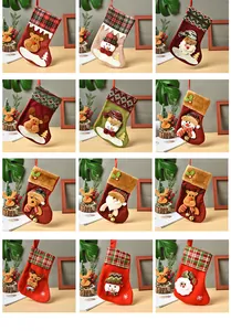 Collage of diverse colorful Christmas stockings with Santa, reindeer and snowman designs