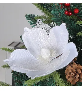 Elegant white artificial Christmas flower with sparkling glitter detail for tree decor
