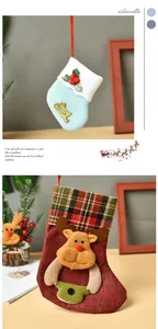 Detailed view of assorted Christmas stockings featuring 3D reindeer and festive patterns.