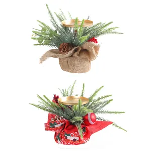 Set of mini Christmas candle holders with pine needles, pine cones and red berries decor