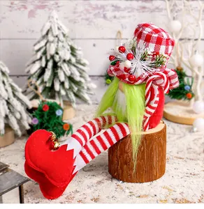 Detailed side view of a Christmas gnome with green beard sitting on a rustic wood stump