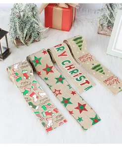 Close-up of festive Christmas burlap ribbons with wired edges and holiday prints