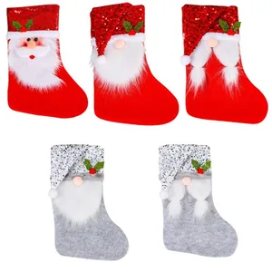 Set of 5 sequined gnome Christmas stockings with beards for holiday gift bags and decor