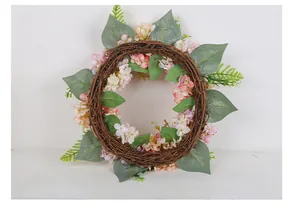 Close-up of artificial hydrangea wreath with dried twig base for wall and door decoration