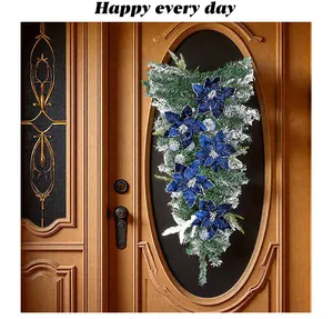 Elegante blauwe fluwelen kerstster swag voor feestelijke kerstdecoratie aan de voordeur
