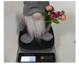 Weight measurement detail of the tulip rudolph gnome plush doll showing 66 grams