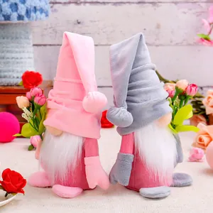 Pair of cute Valentine's Day gnome plush dolls holding flowers for home decoration