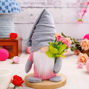 Adorable plush Valentine's Day gnome holding a pink rose bouquet for festive home decoration