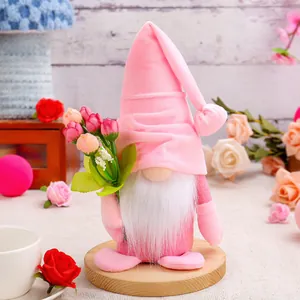 Adorable pink plush gnome holding a floral bouquet for Valentine's Day gift decor