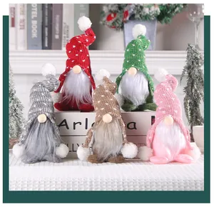 Group display of five colorful Christmas forest gnomes with knitted pom-pom hats