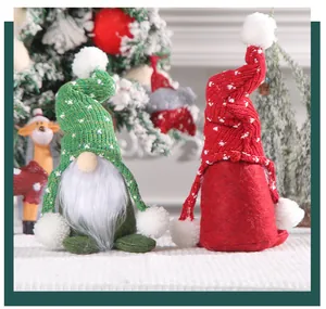 Pair of plush Christmas gnomes with knitted hats and fuzzy beards displayed together