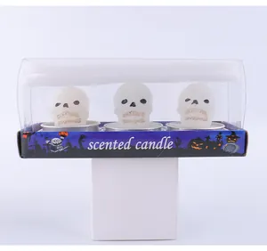 Detailed view of Halloween skull scented candles in a themed decorative packaging box