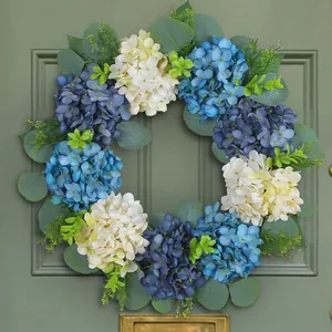 Elegant blue and white artificial hydrangea door wreath with green eucalyptus foliage
