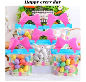 Macro view of colorful speckled Easter foam eggs packed in decorative pink bow gift bags