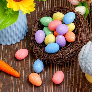 Colorful speckled foam Easter eggs in a decorative nest for DIY festive party decoration