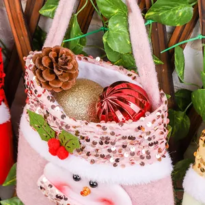 Bolsa de regalo de Navidad rosa con lentejuelas, diseño de muñeco de nieve.