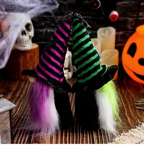 Close-up of Halloween gnome decorations with colorful striped wizard hats