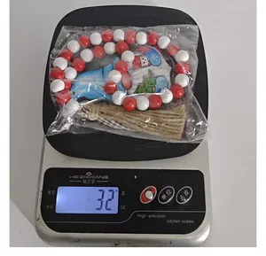 Weihnachts-Holzperlengirlande mit Quaste und Anhänger, wiegt 32 g auf einer Küchenwaage
