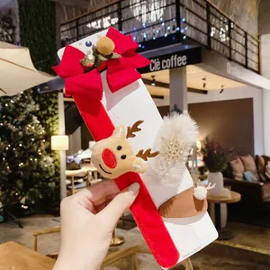 Lot de barrettes de Noël avec nœud rouge et renne en peluche sur carte