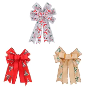 Decorative set of three festive double-layer Christmas bows with Santa and tree patterns