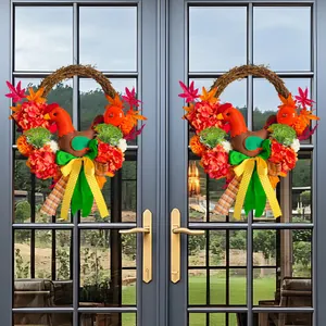 Thanksgiving chicken hydrangea wreaths hanging on double glass doors for autumn decor.