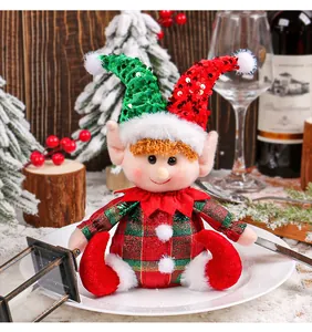 Detailed macro shot of a cute Christmas elf doll featuring a sparkly sequin hat