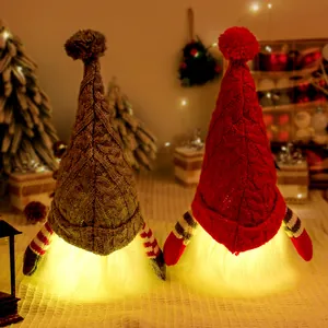 Glowing Christmas gnomes with knitted hats and warm LED beards for festive home decor