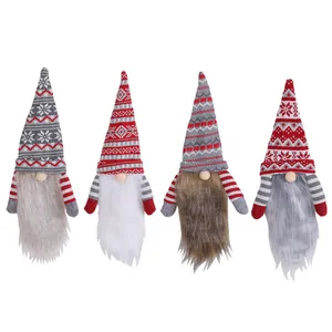 Set of four knitted Christmas faceless gnomes used for festive wine bottle covers