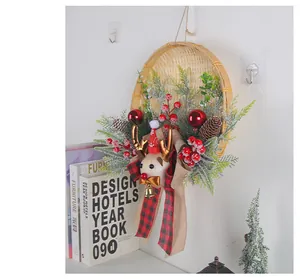 Detailed view of the reindeer themed Christmas wreath basket hanging on a wall