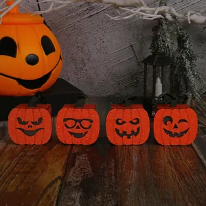 Set di 4 lanterne di zucca di Halloween glitterate con espressioni buffe per decoro