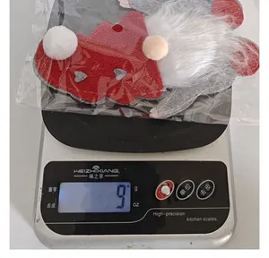 Detailed view of the 9g weight measurement for the Christmas gnome felt cutlery bag