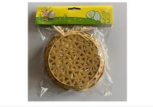 Yellow Easter woven basket inside clear plastic packaging with festive illustrated header