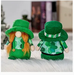Close-up detail of plush gnomes featuring green felt hats and festive clover prints decor